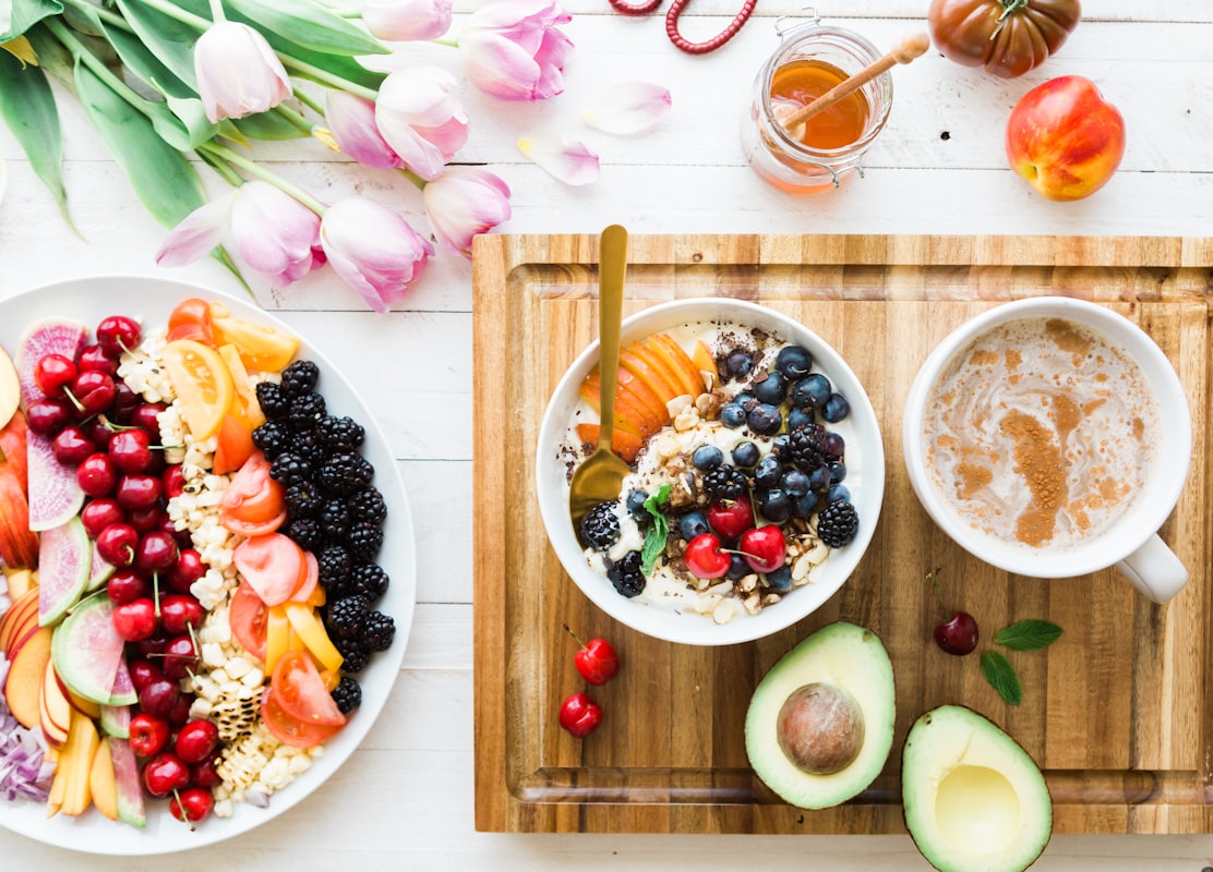 Vibrant smoothie bowl with berries, granola, and coconut